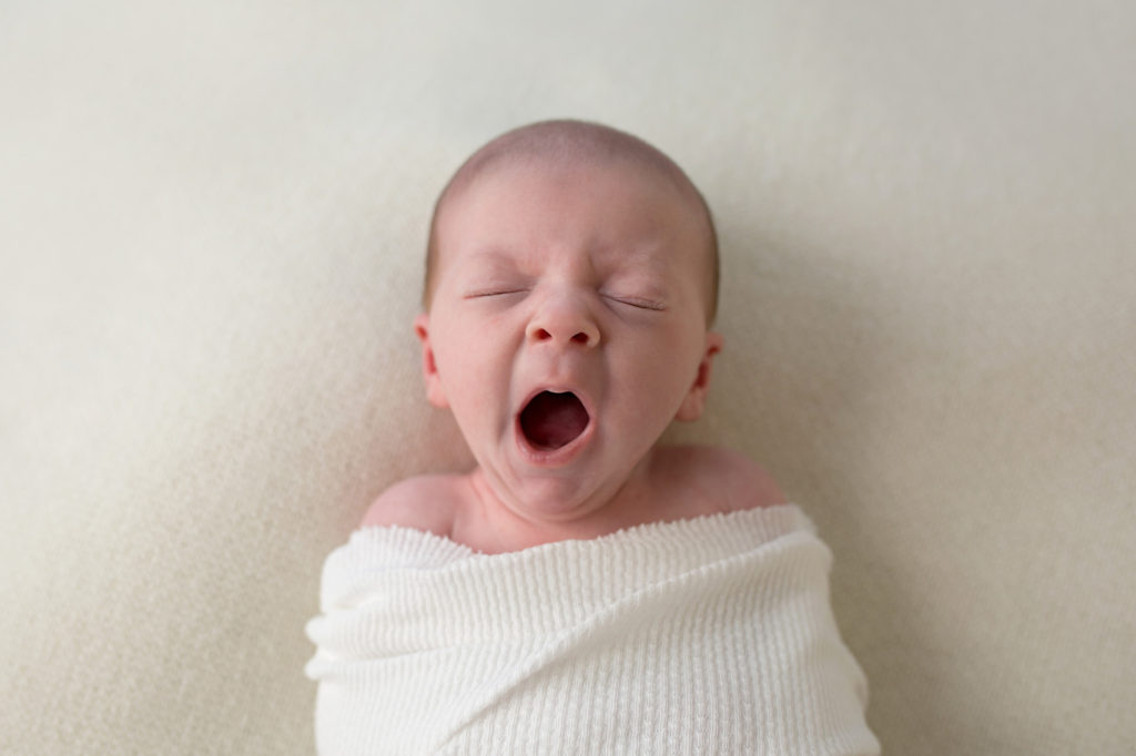 baby boy newborn yawning