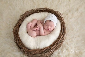newborn baby girl nest studio