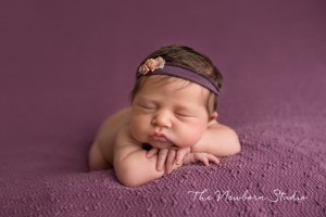 newborn baby girl purple studio