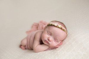 newborn baby girl pink cream neutral