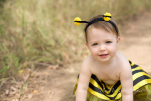 bee outfit baby girl outdoors