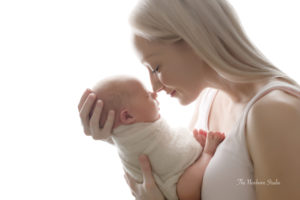 baby girl with mum backlit photo studio