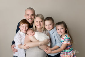 family and newborn studio photo