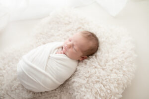 newborn neutral baby wrapped