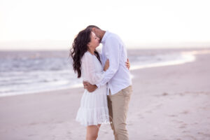 couple hugging on the beach
