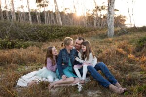 family being photographed in the bush